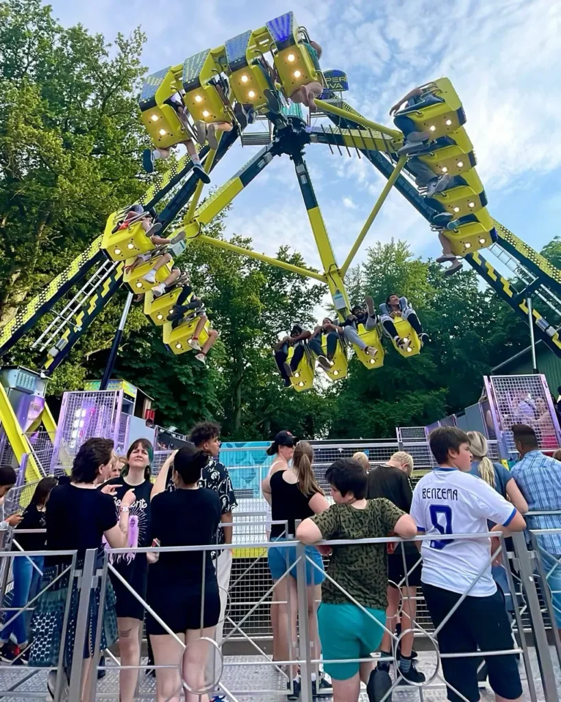People enjoying the Bakken amuseument park Rides