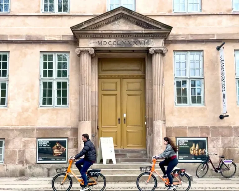 Tourists exploring the Copenhagen must do things on a bike/ bicycle