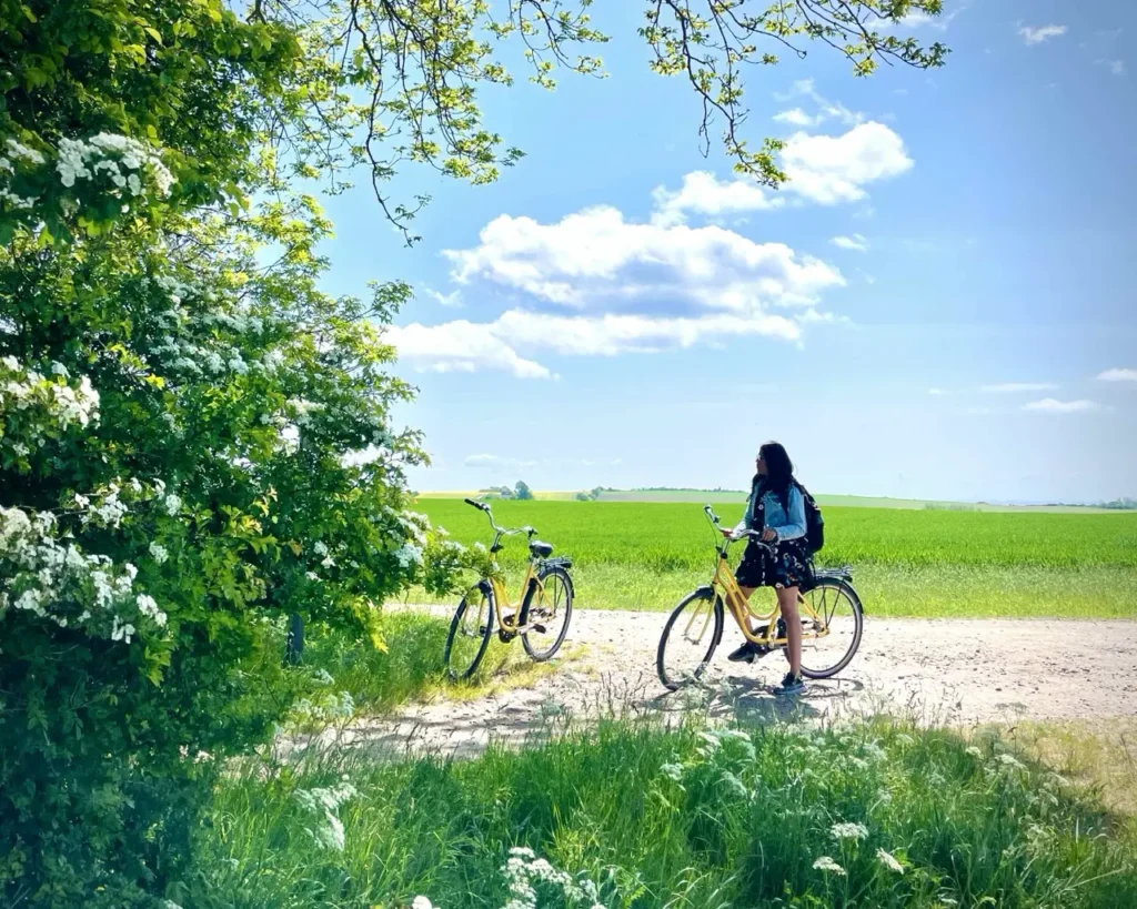 Agalya exploring Ven Island in a Yellow bicycle