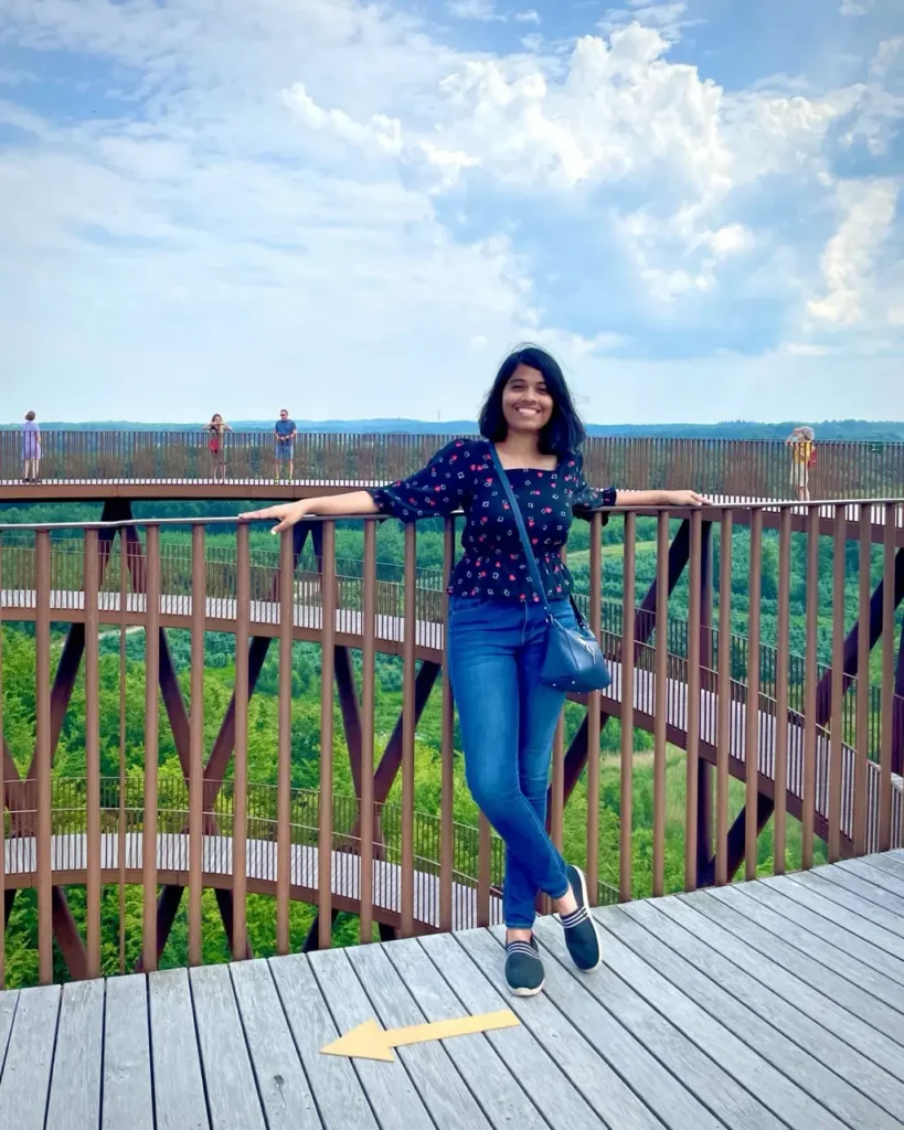 Agalya standing on the tallest point of Forest Tower Camp Adventure