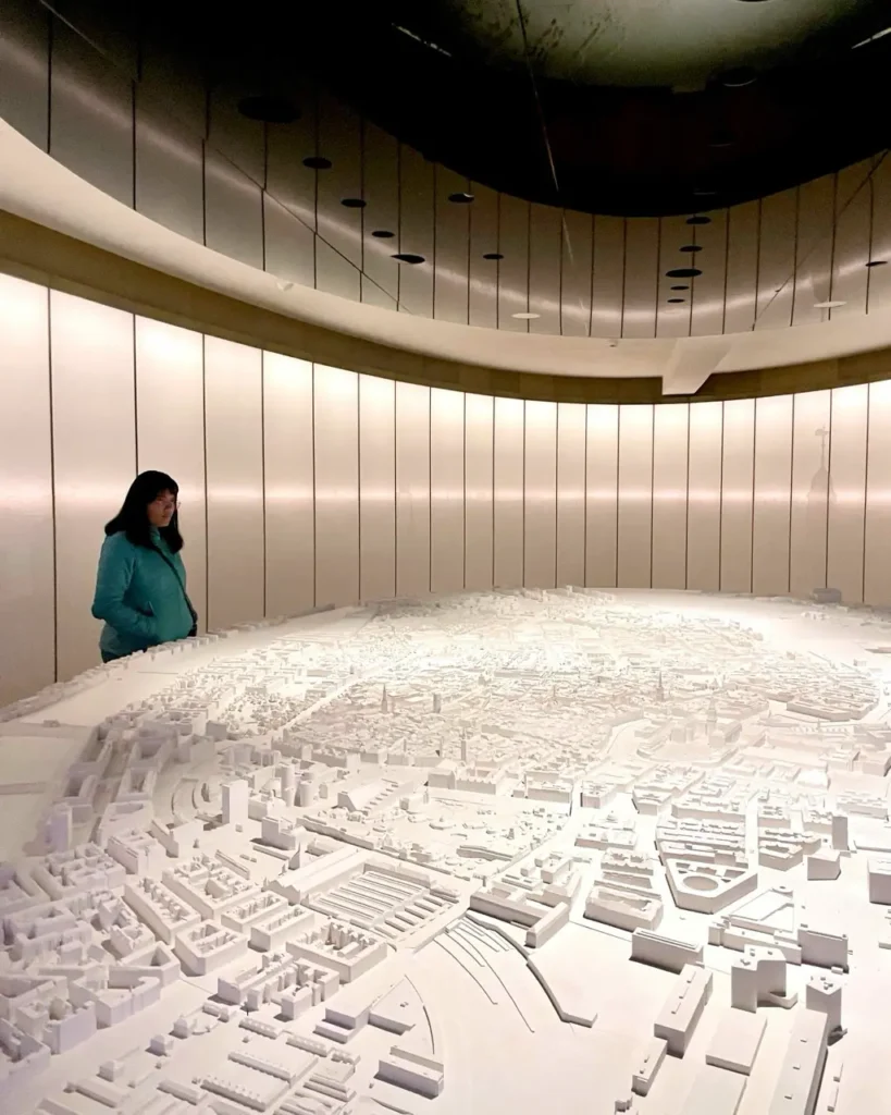 Agalya looking at the city model at the Museum of Copenhagen