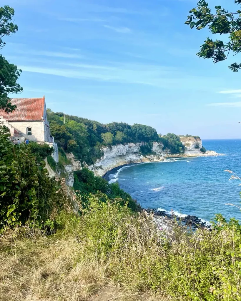 Stevns Klint church, limestone clif, and beach